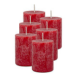 6 Stumpenkerzen von Decolite in der Größe 8x6cm in der Farbe rot.